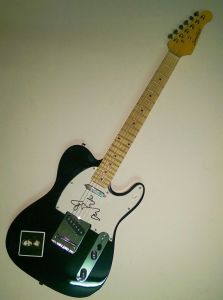 Adele signed guitar